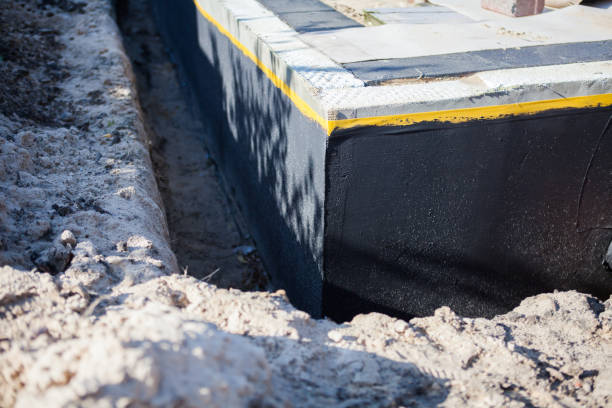 Professional Interior Drainage System technician working in Helenville, WI